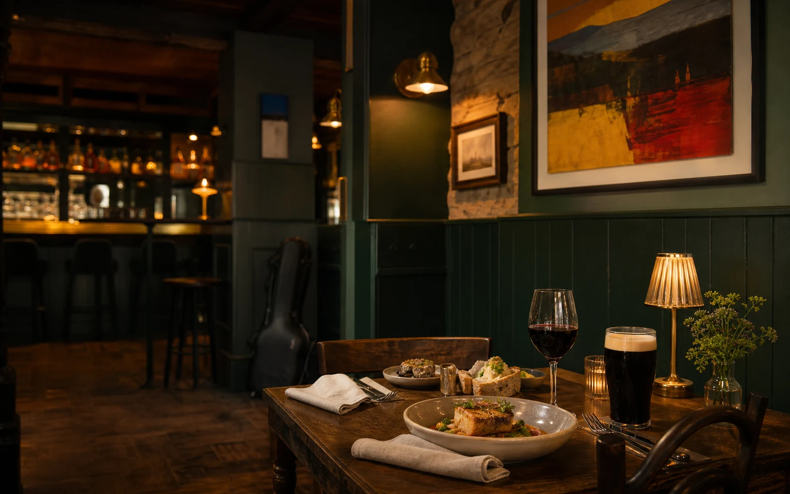 Warm bistro table with Irish food, wine and stout in Bofey Quinn's