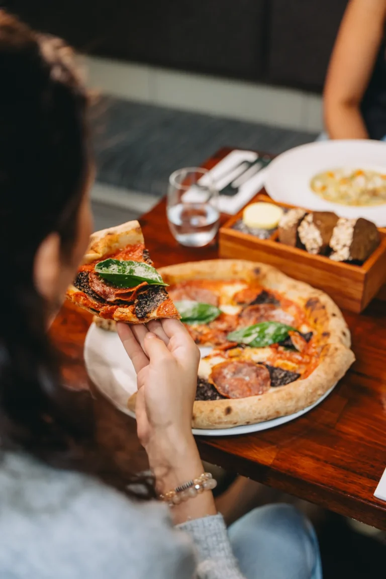 Enjoying pizza in the dining room