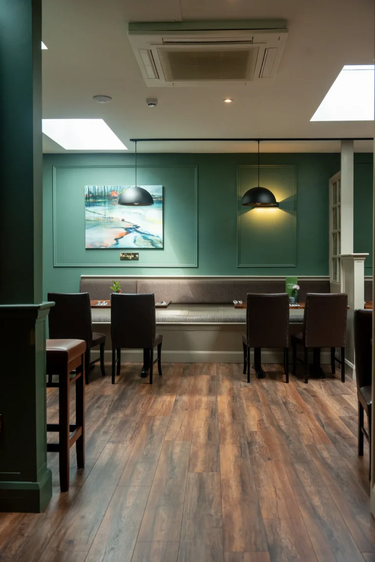 Artwork and seating in the dining room