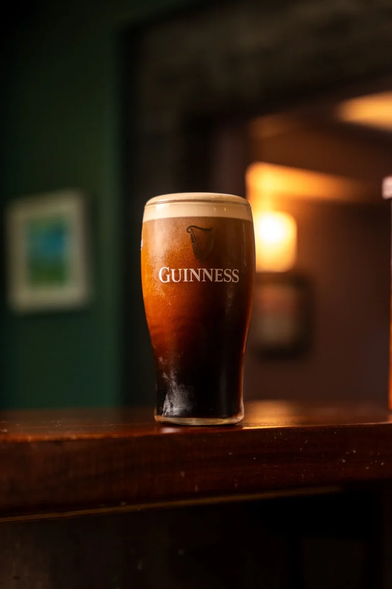 A pint of Guinness at the bar