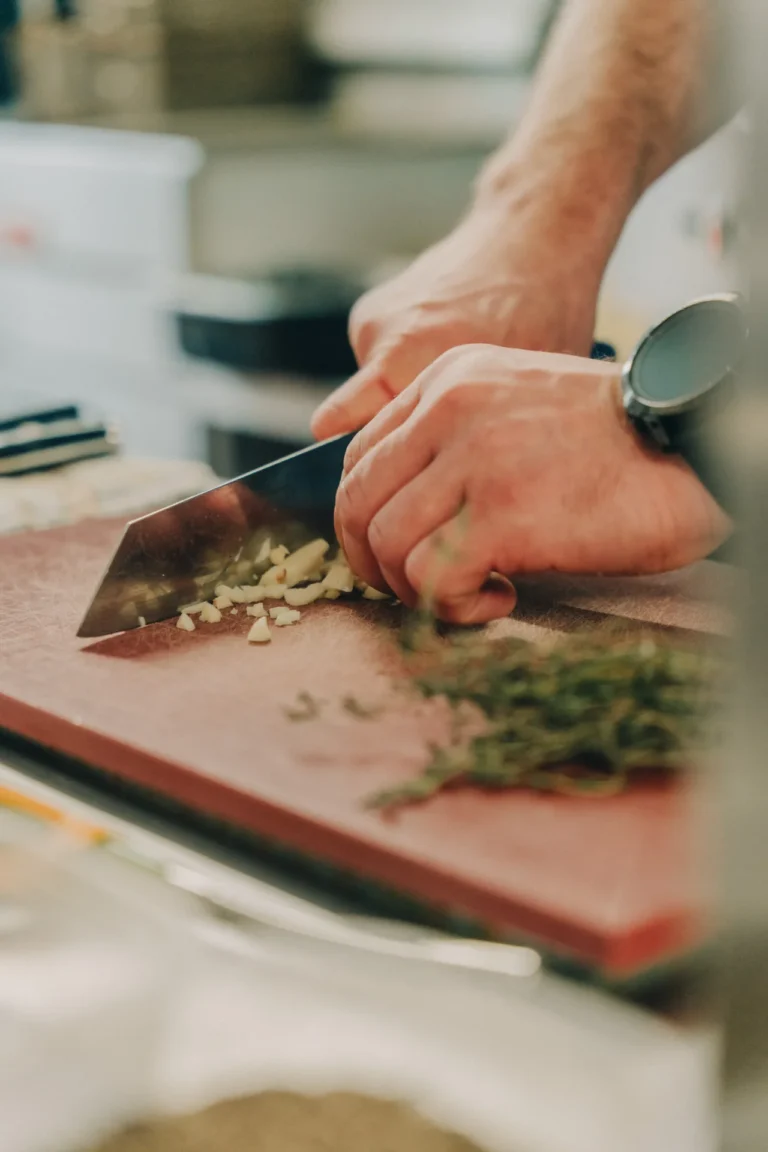 Preparing fresh herbs in the kitchen