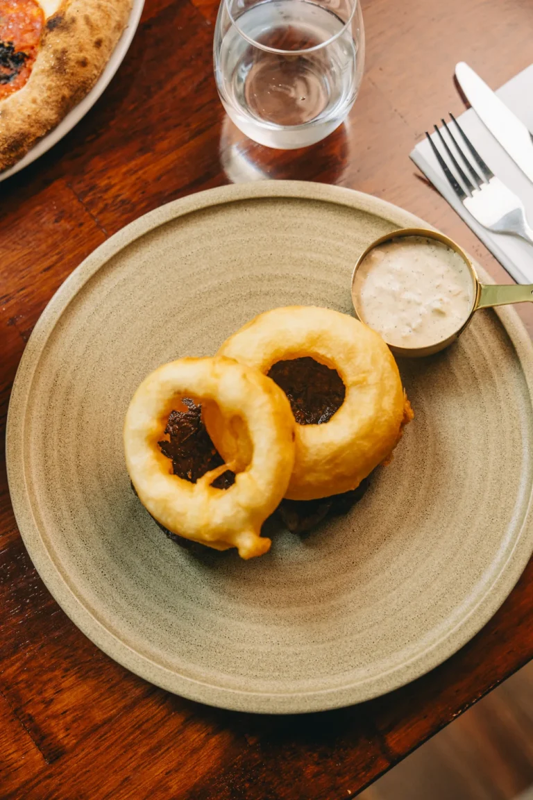 Steak with golden onion rings